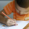 Kid with coloring pages